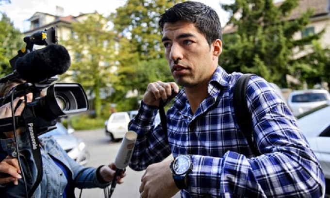 Football: Luis Suarez loses appeal against four-month biting ban but clear to train
